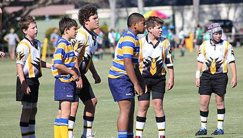Players await the referee’s decision. Players await the referee’s decision.